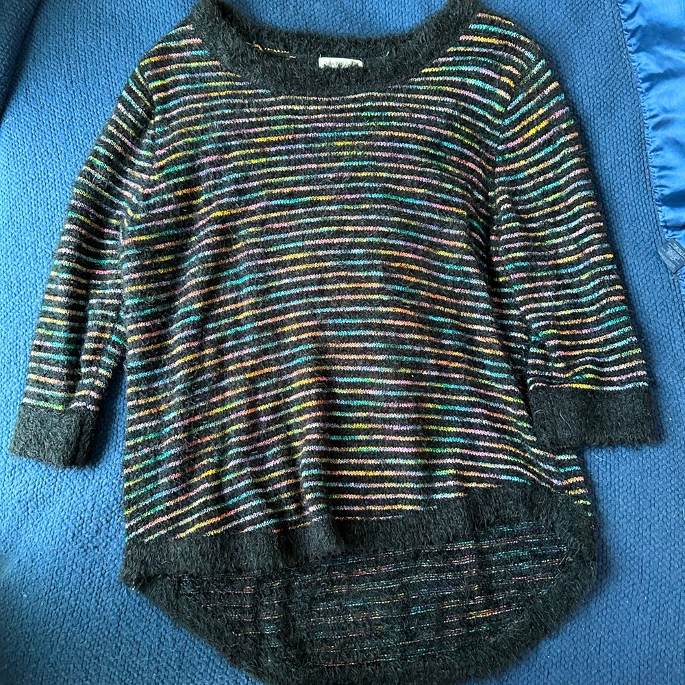 Super soft, XL, black John Paul Richard sweater with rainbow colored stripes.